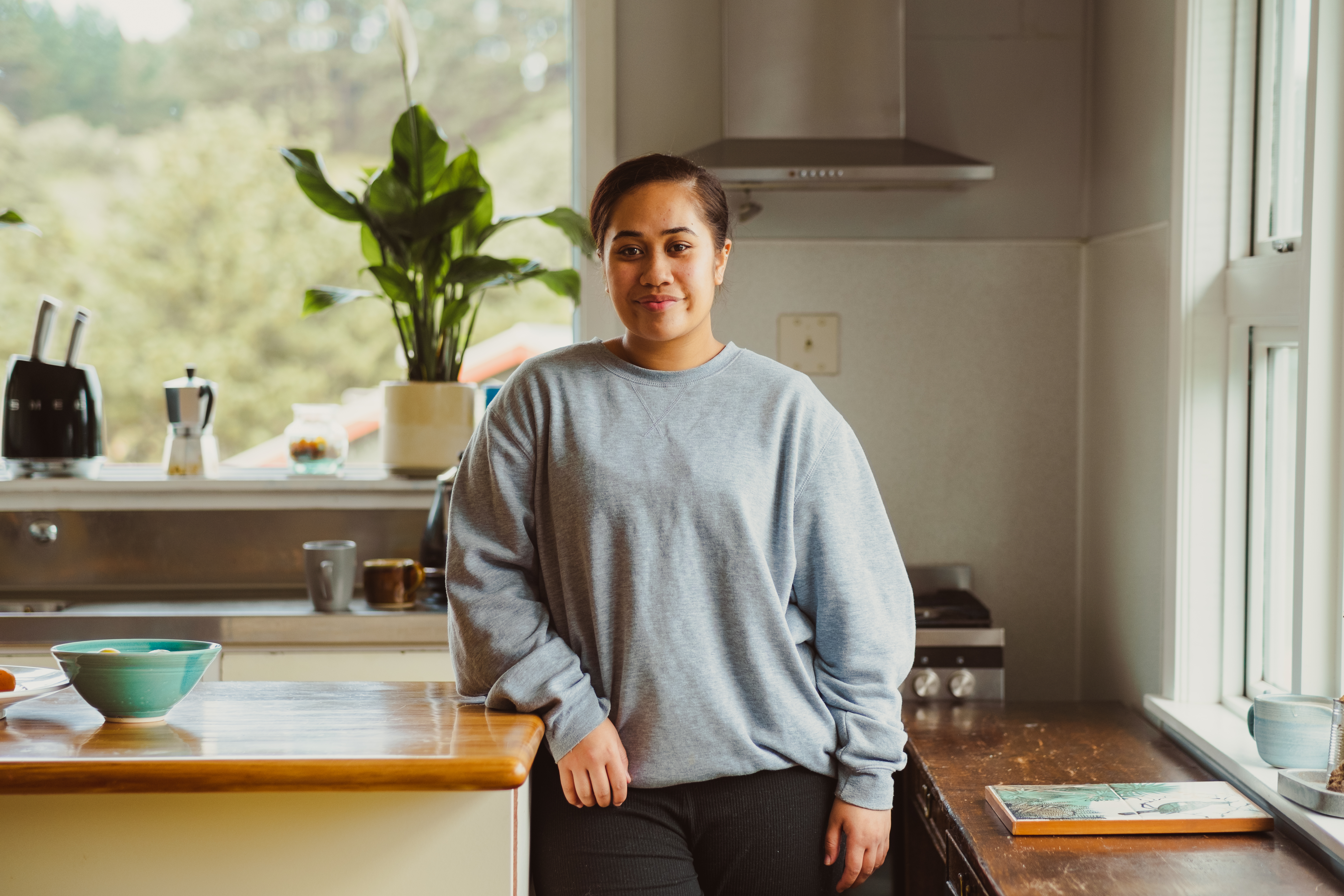 Young woman in kitchen