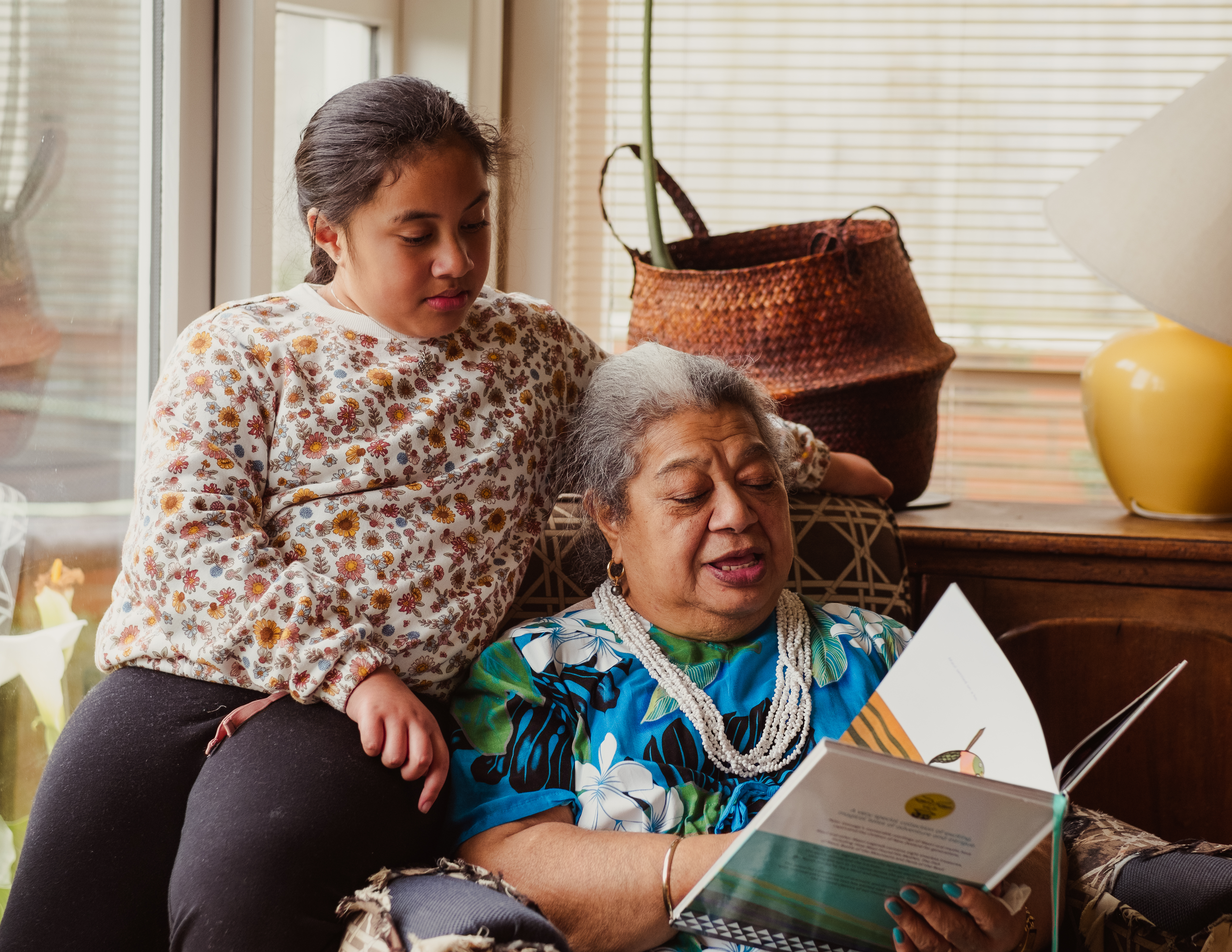 Grandma reads to child